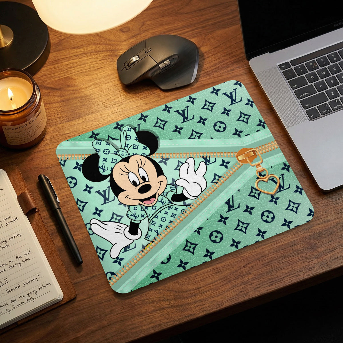 Minnie Mouse on teal background with LV-style pattern and gold heart zipper pull.