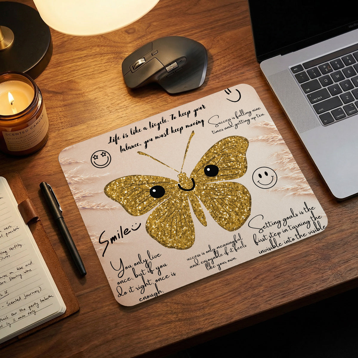Mousepad with glittery gold butterfly and inspirational quotes.