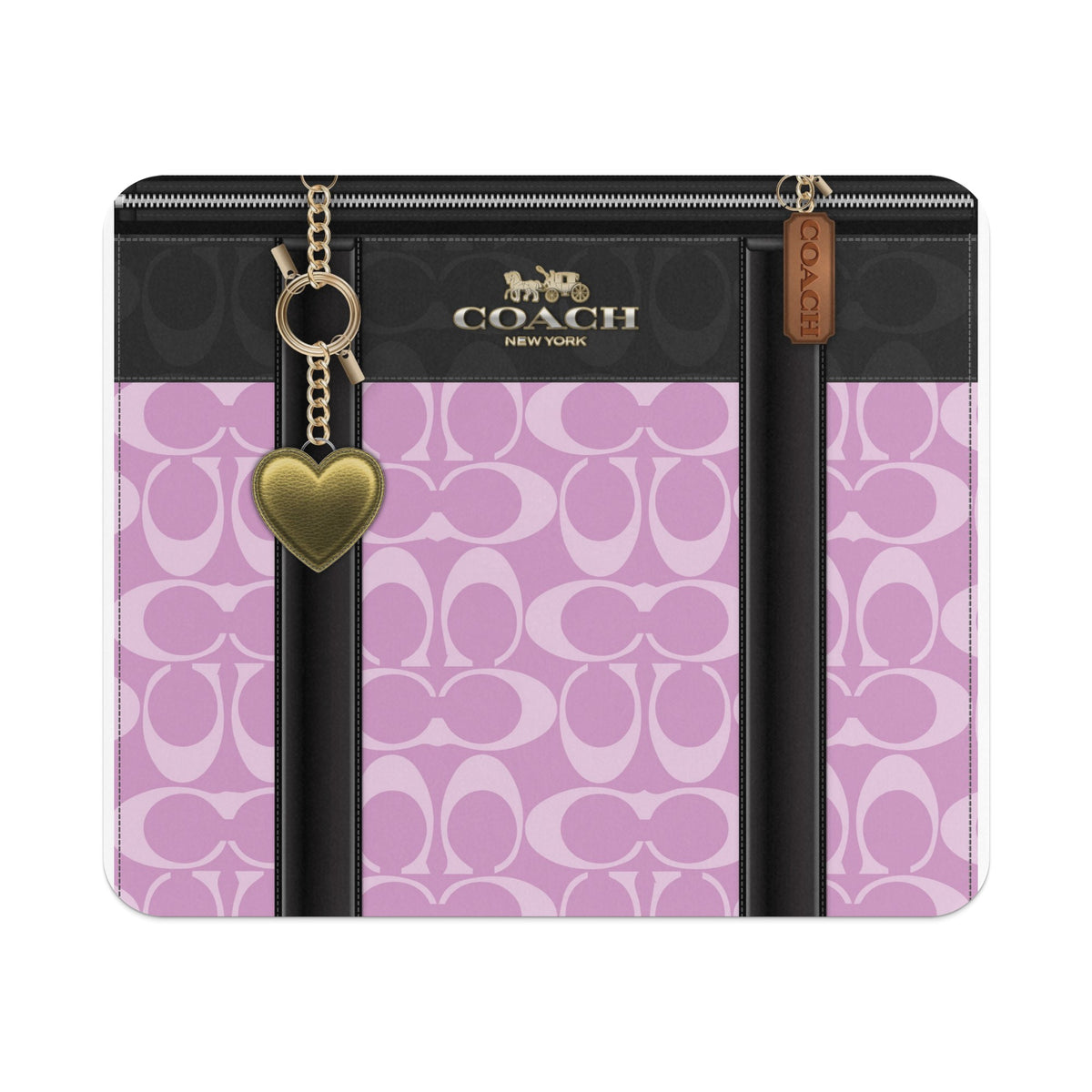 Coach bag detail with pink and black monogram pattern, gold heart charm.