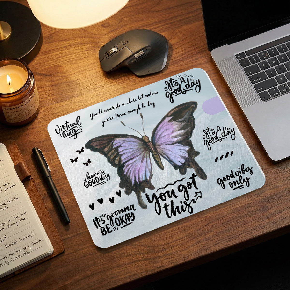 Mousepad with a butterfly and inspirational quotes.