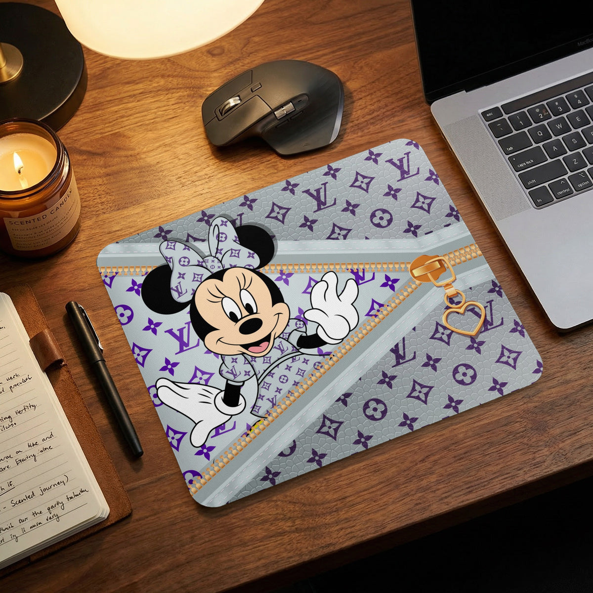Minnie Mouse on gray mousepad with purple pattern and gold zipper detail.