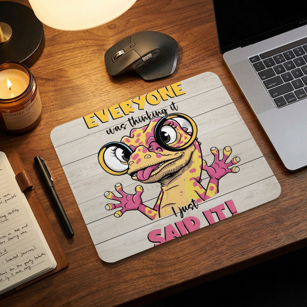 A mousepad featuring a cartoon lizard wearing glasses and the text Everyone was thinking it, I just said it.