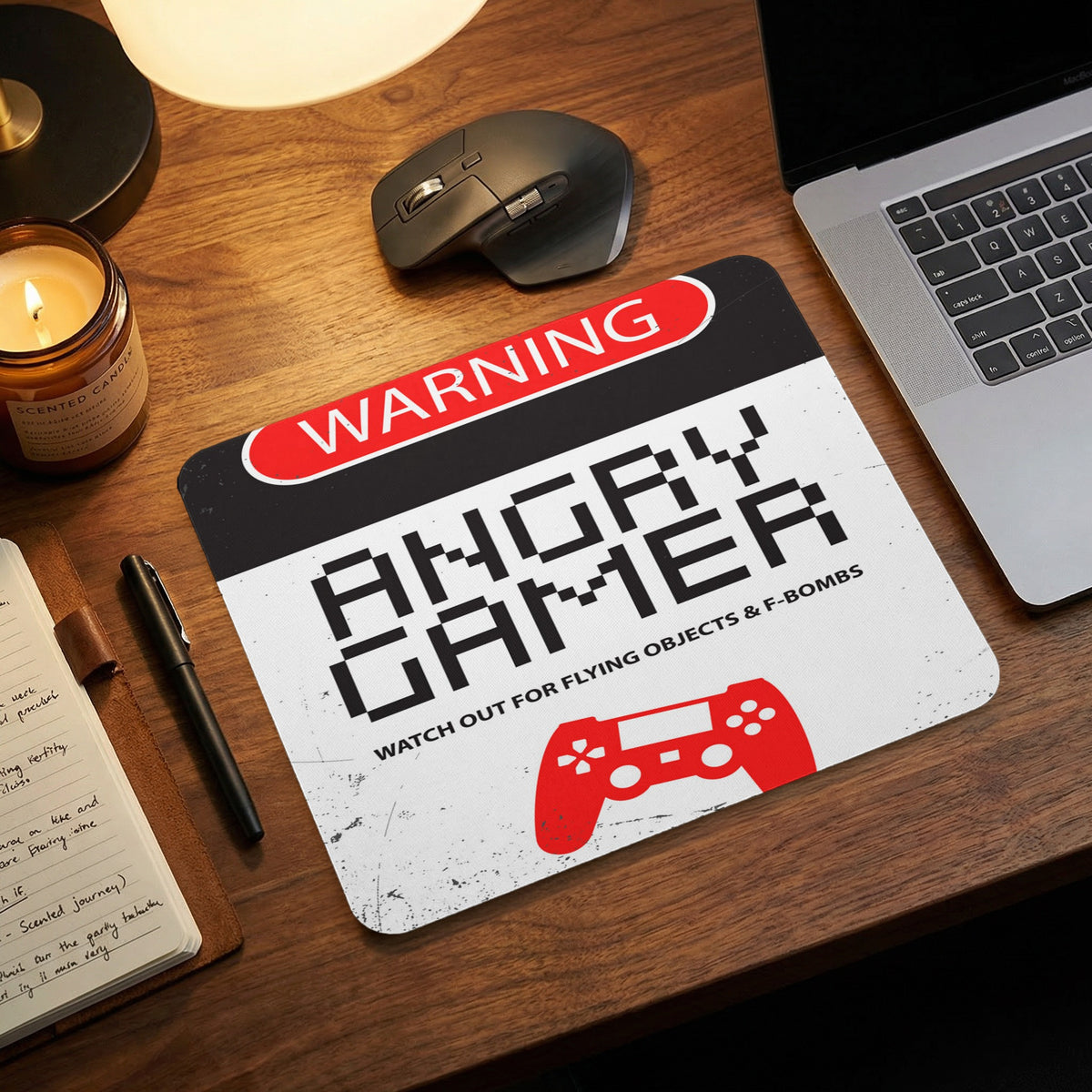 Rectangular mouse pad featuring an Angry Gamer warning sign with a red game controller graphic on a wooden desk.
