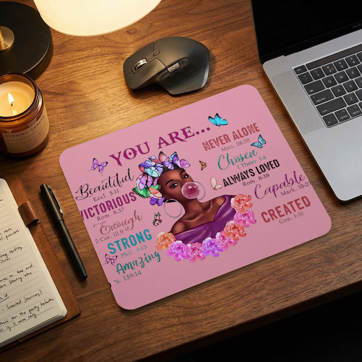 Pink mousepad with "You Are..." affirmations and butterfly-adorned Black woman illustration.