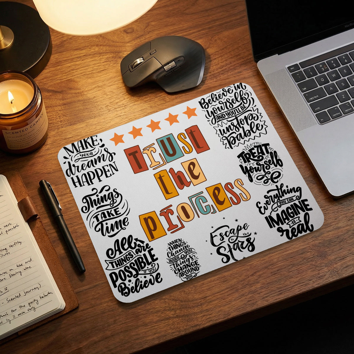 Mousepad with motivational quotes including "Trust the Process" and "Make your dreams happen".