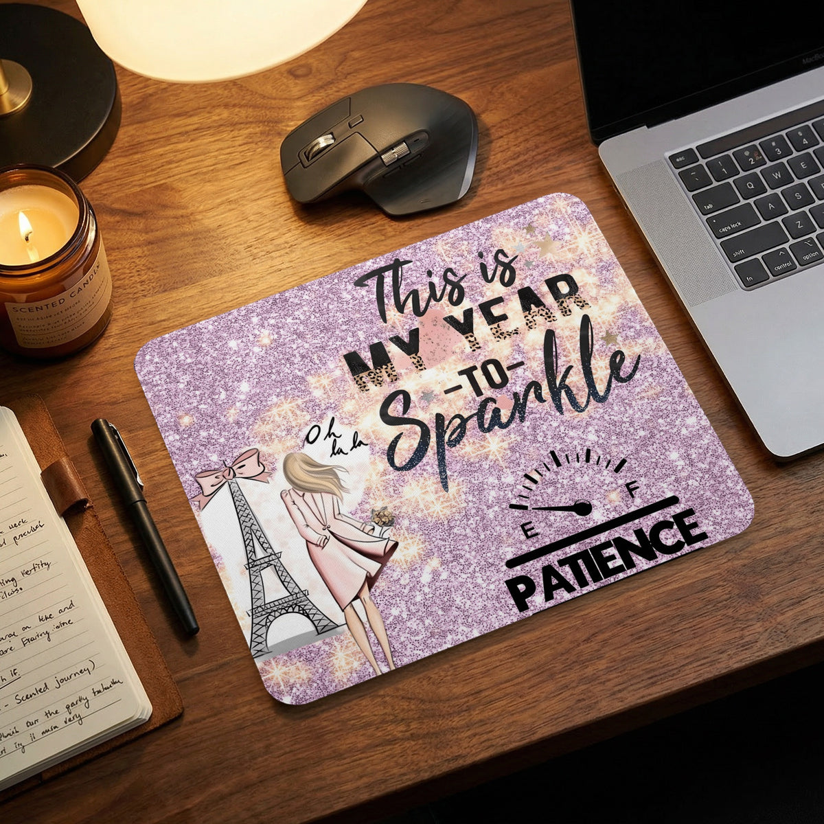 A sparkly pink mouse pad featuring the text This is My Year to Sparkle and Patience.