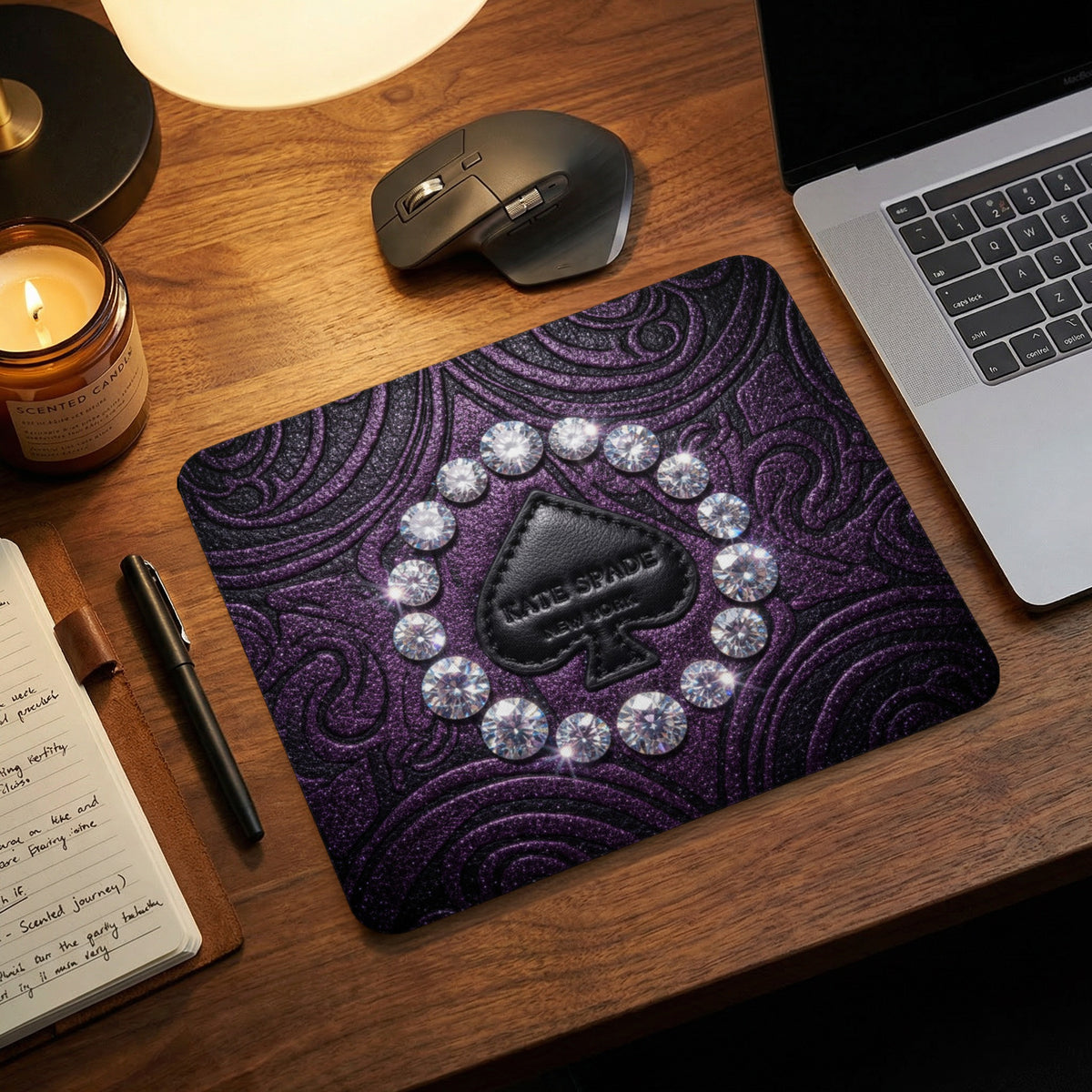 Purple textured mousepad with spade logo and sparkling diamonds.