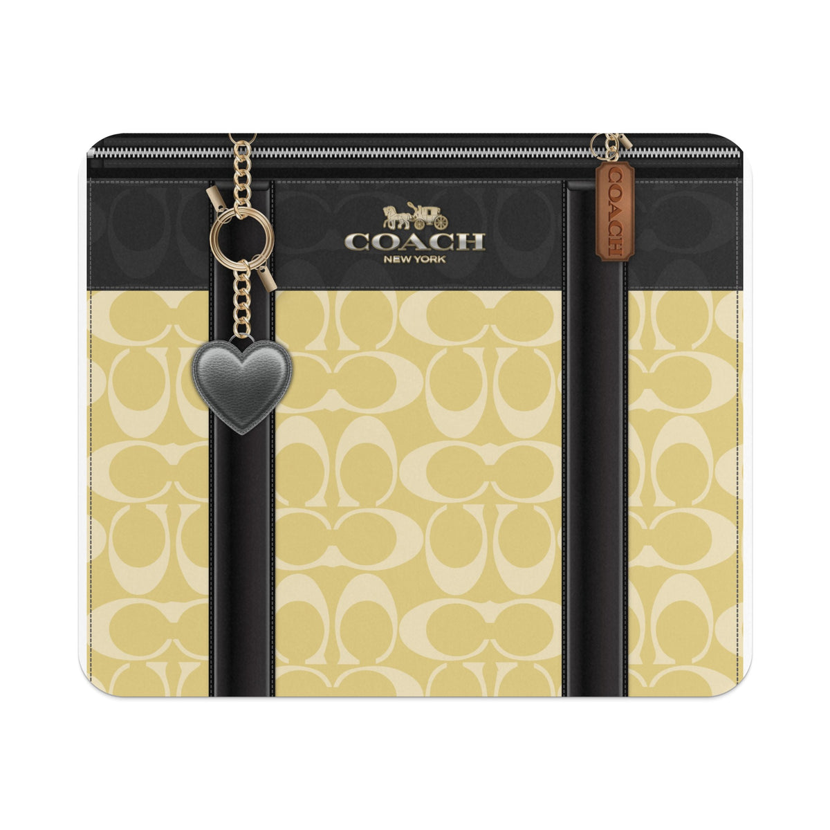 Coach New York bag with signature print, black trim, heart charm, and zipper.