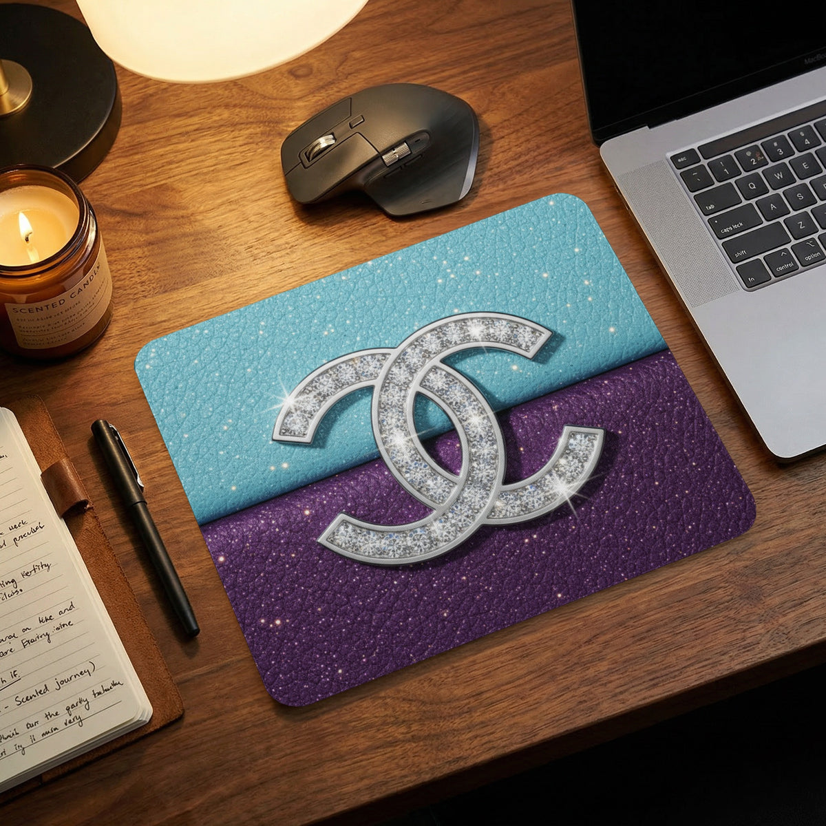 Mousepad with a glittery dual-tone design and a double C logo.