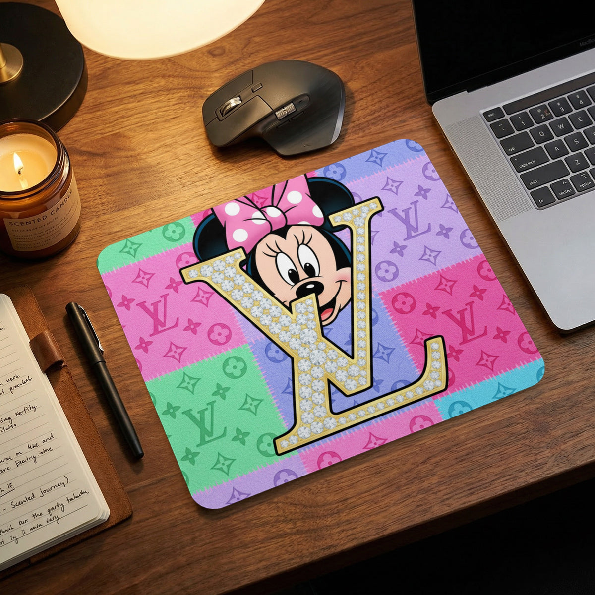 Minnie Mouse in front of a diamond-studded "LV" logo on a patchwork mousepad.