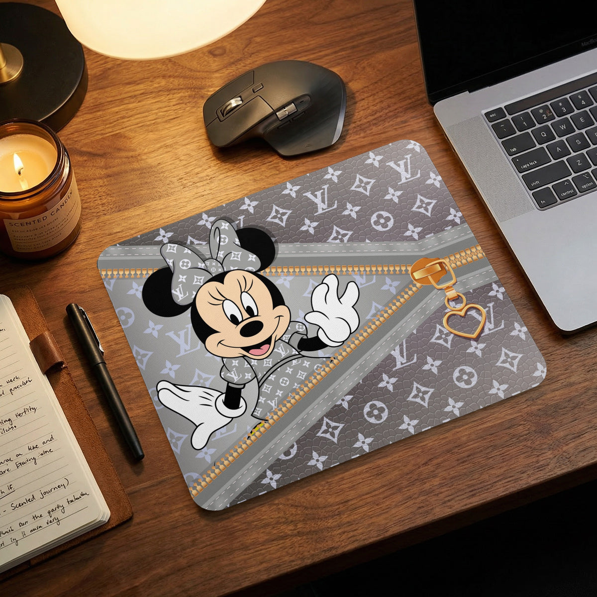 Minnie Mouse with LV pattern mousepad and gold zipper detail.