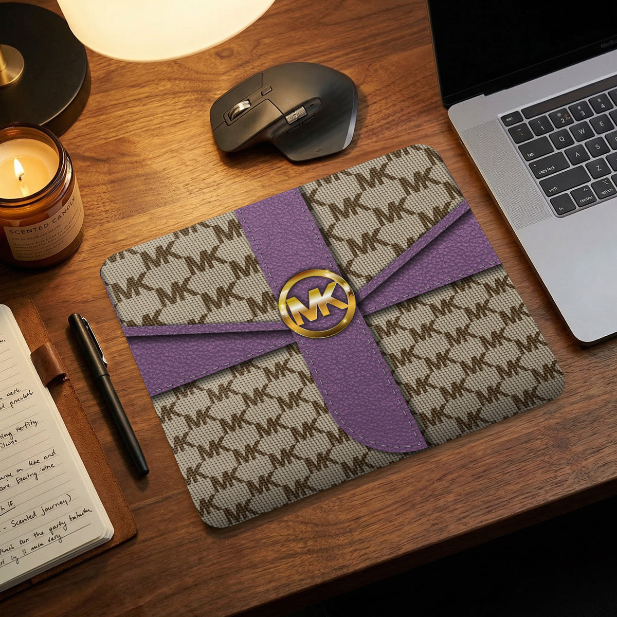 Michael Kors logo mousepad with monogram pattern and purple ribbon detail.