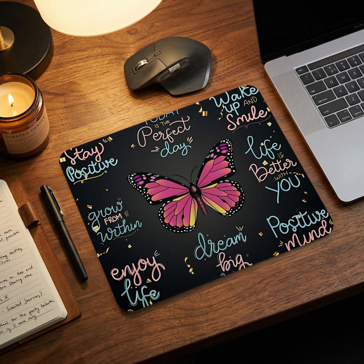 Black mousepad with pink butterfly and motivational quotes like "Stay Positive" and "Dream Big."
