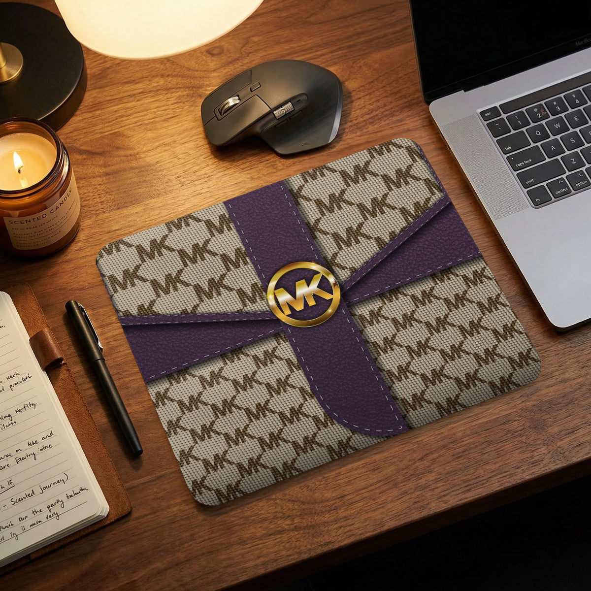 Mousepad with MK logo pattern and purple ribbon detail.