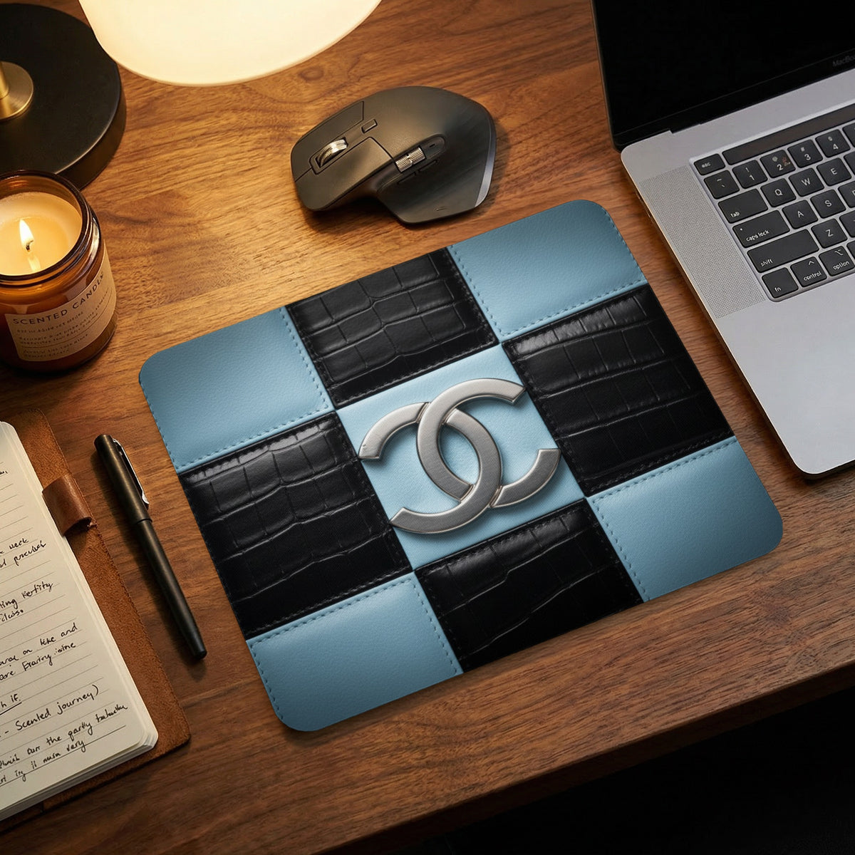 Mousepad with checkerboard pattern, light blue, black croc, and silver CC logo.