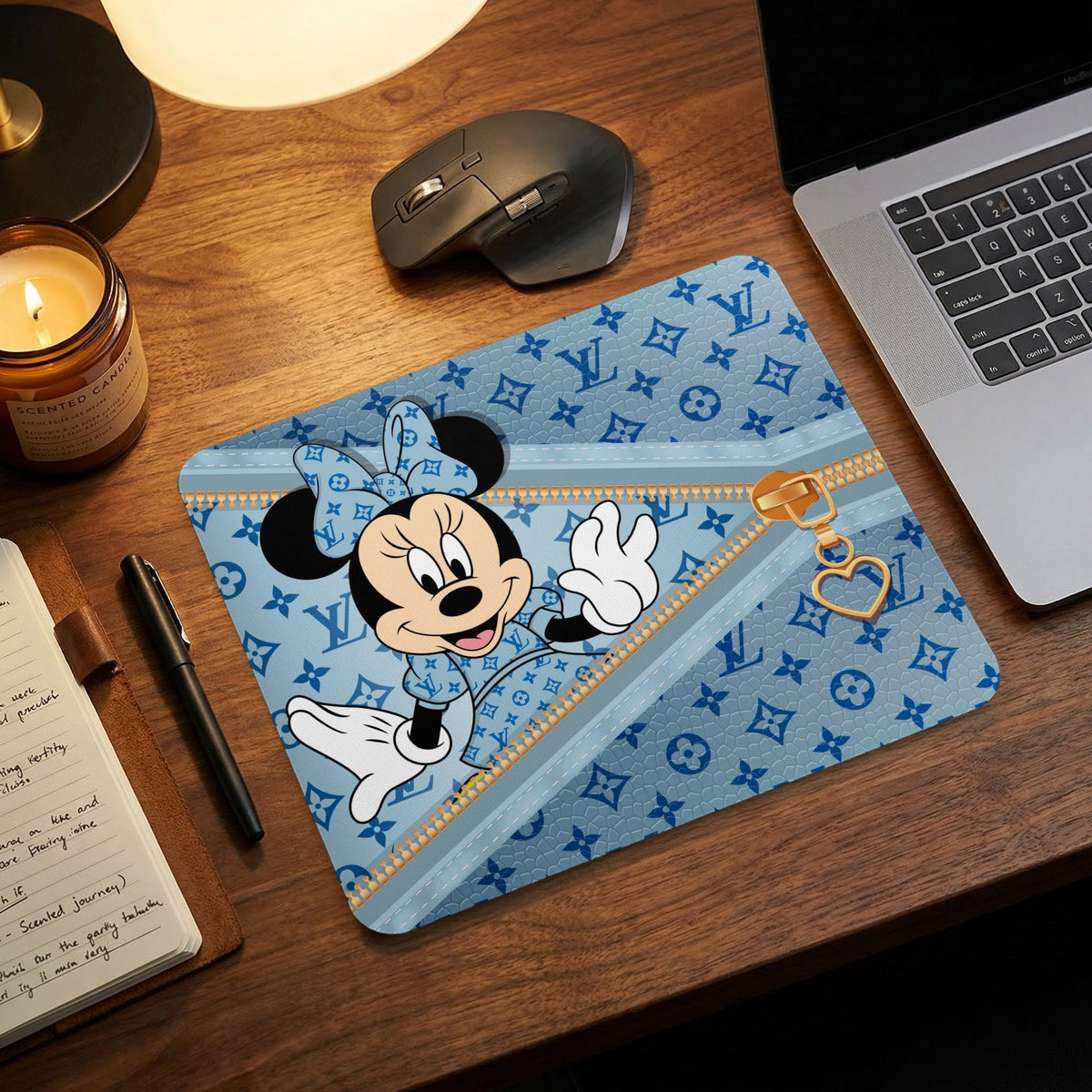 Minnie Mouse on a blue background with a gold zipper and heart charm.