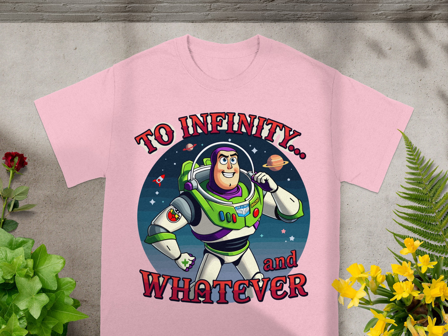 Buzz Lightyear on pink t-shirt with text "To Infinity... and Whatever".