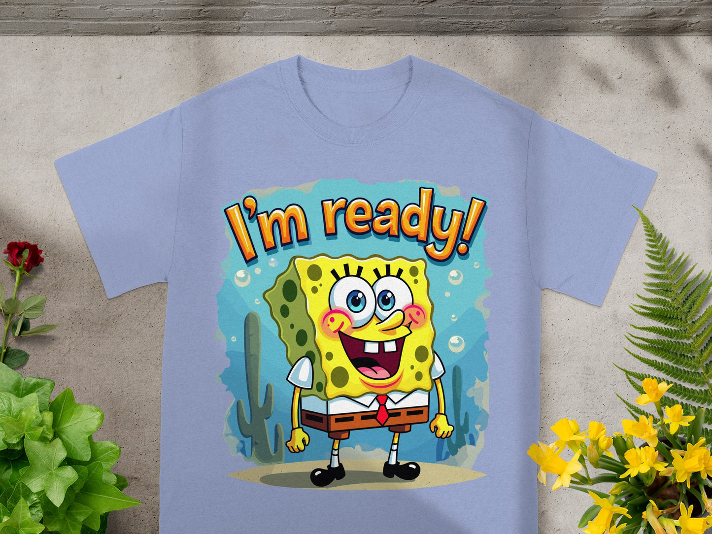 SpongeBob SquarePants saying "I'm ready!" on a light purple t-shirt.