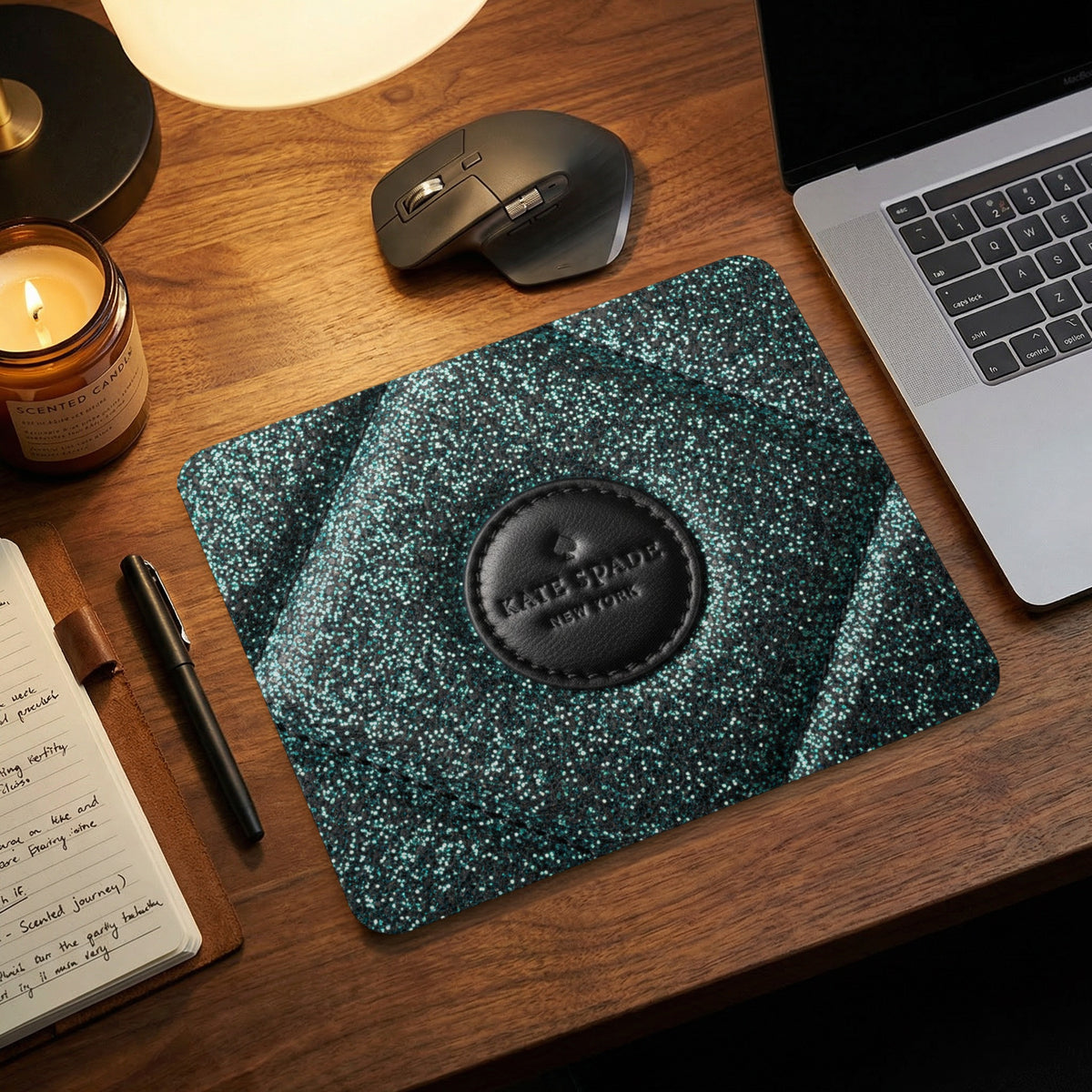 Kate Spade New York glitter mousepad with a laptop and candle.
