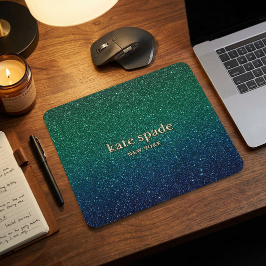 Kate Spade New York glitter mousepad with teal and blue ombre.