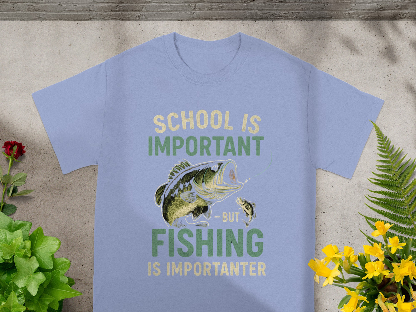 Light blue t-shirt with "School is Important, but Fishing is Importanter" graphic.