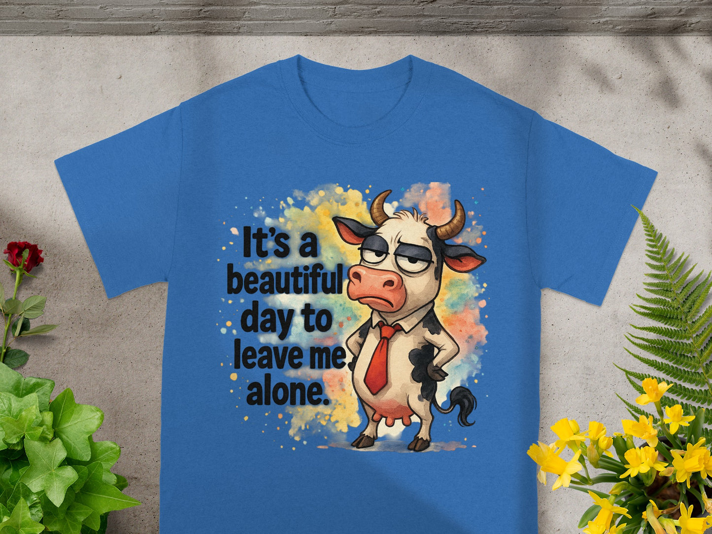 Blue t-shirt with a cartoon cow wearing a tie and the text "It's a beautiful day to leave me alone."