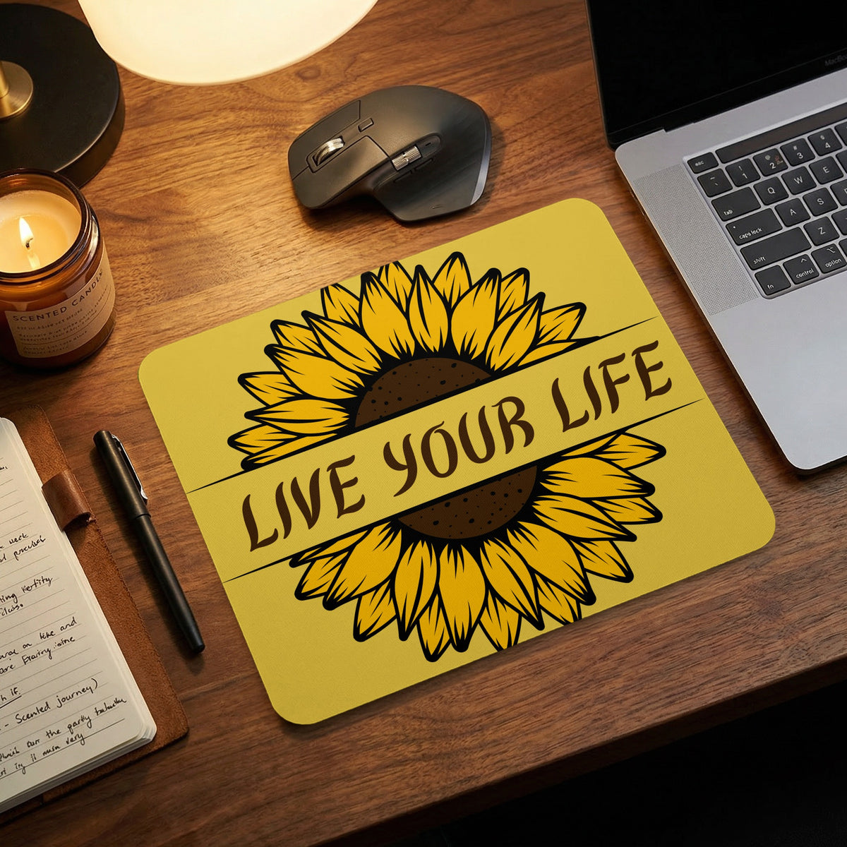 Yellow mousepad with "LIVE YOUR LIFE" text and a sunflower illustration.