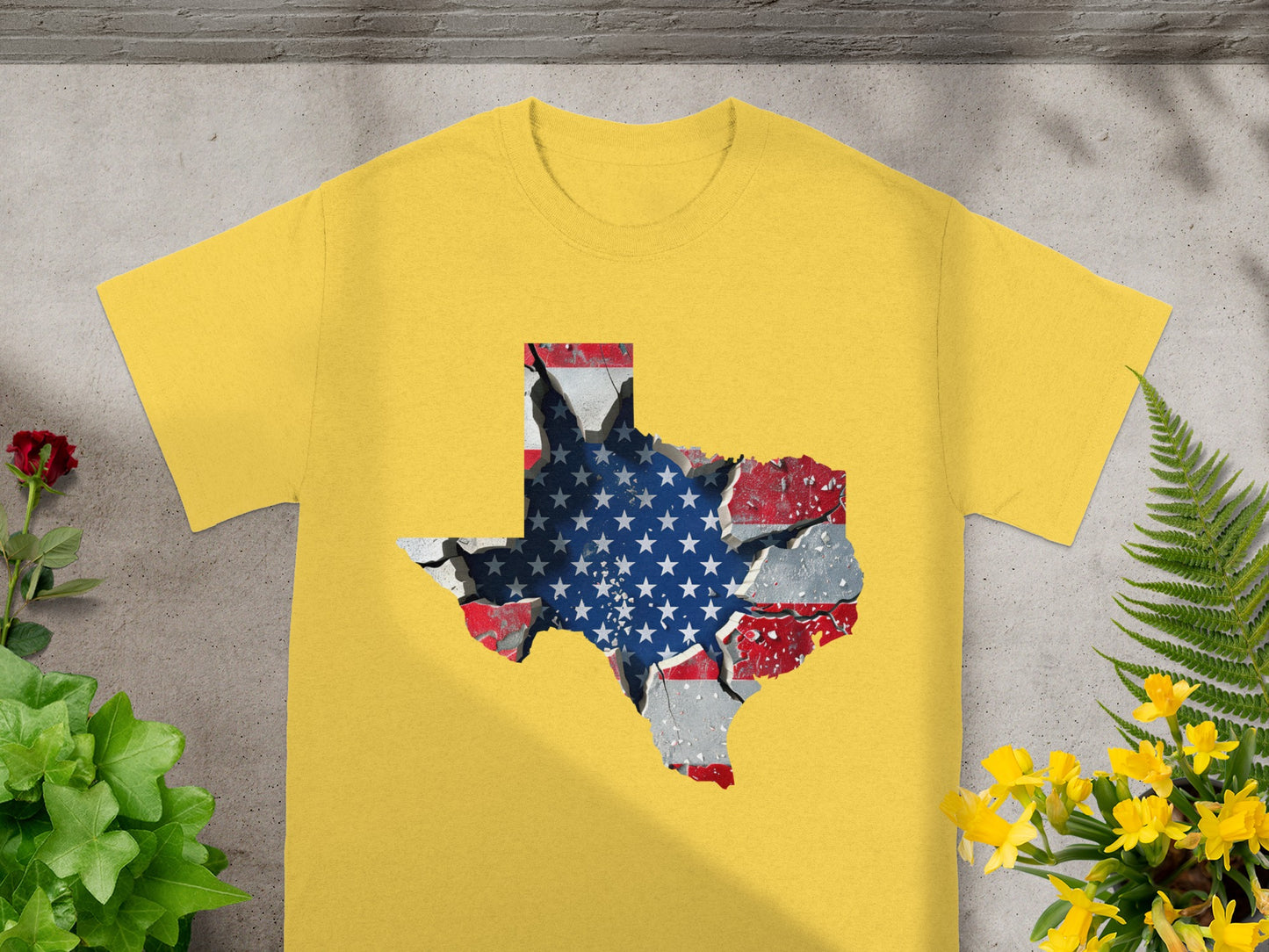 Yellow t-shirt with a cracked Texas map graphic filled with the American flag.
