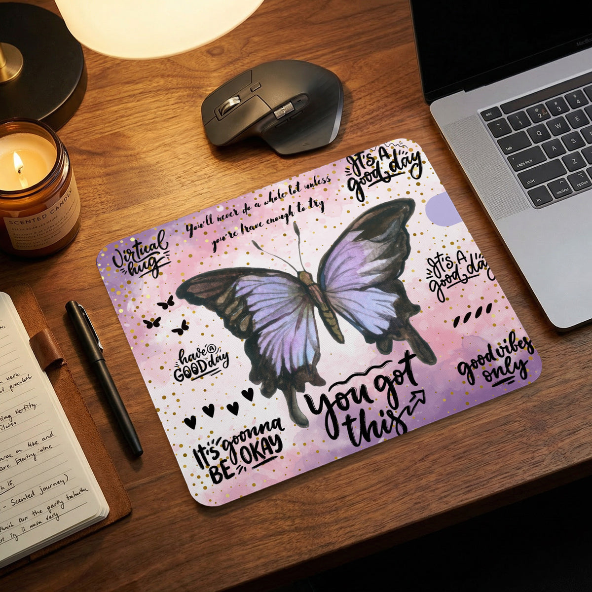 Mousepad with purple and pink watercolor, butterfly, and motivational text.