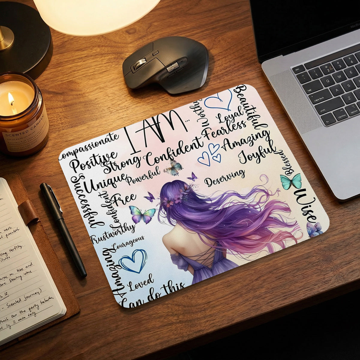 Mousepad with "I AM" and positive affirmations surrounding a woman with purple hair.