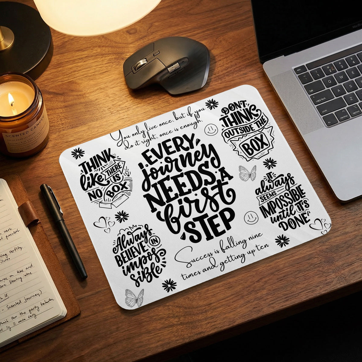 Mousepad with inspirational quotes: "Every journey needs a first step" and "Think outside the box."