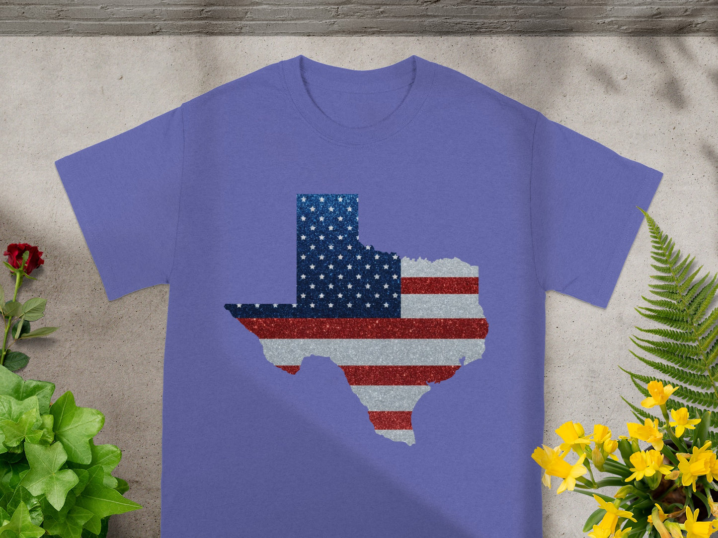 Purple t-shirt with glittery Texas outline filled with American flag colors.