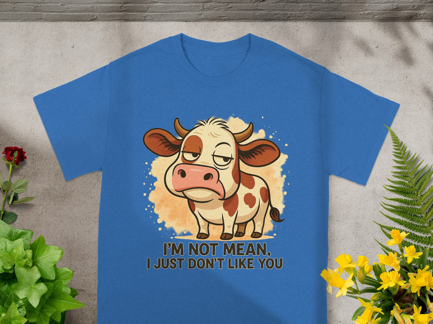 Blue t-shirt with cartoon cow saying "I'm not mean, I just don't like you".