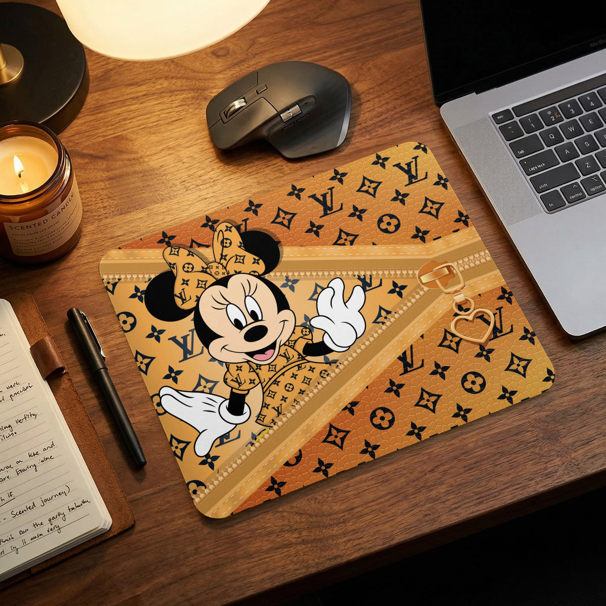 Minnie Mouse on a gold patterned mousepad with a zipper detail.