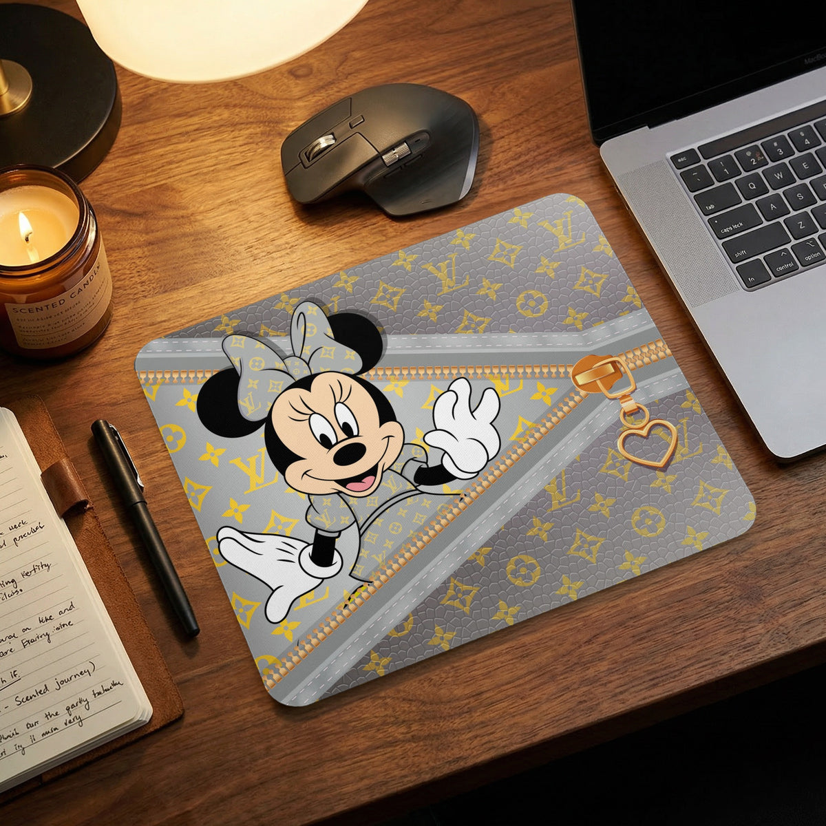 Mousepad with Minnie Mouse on gray background with gold pattern and heart zipper charm.