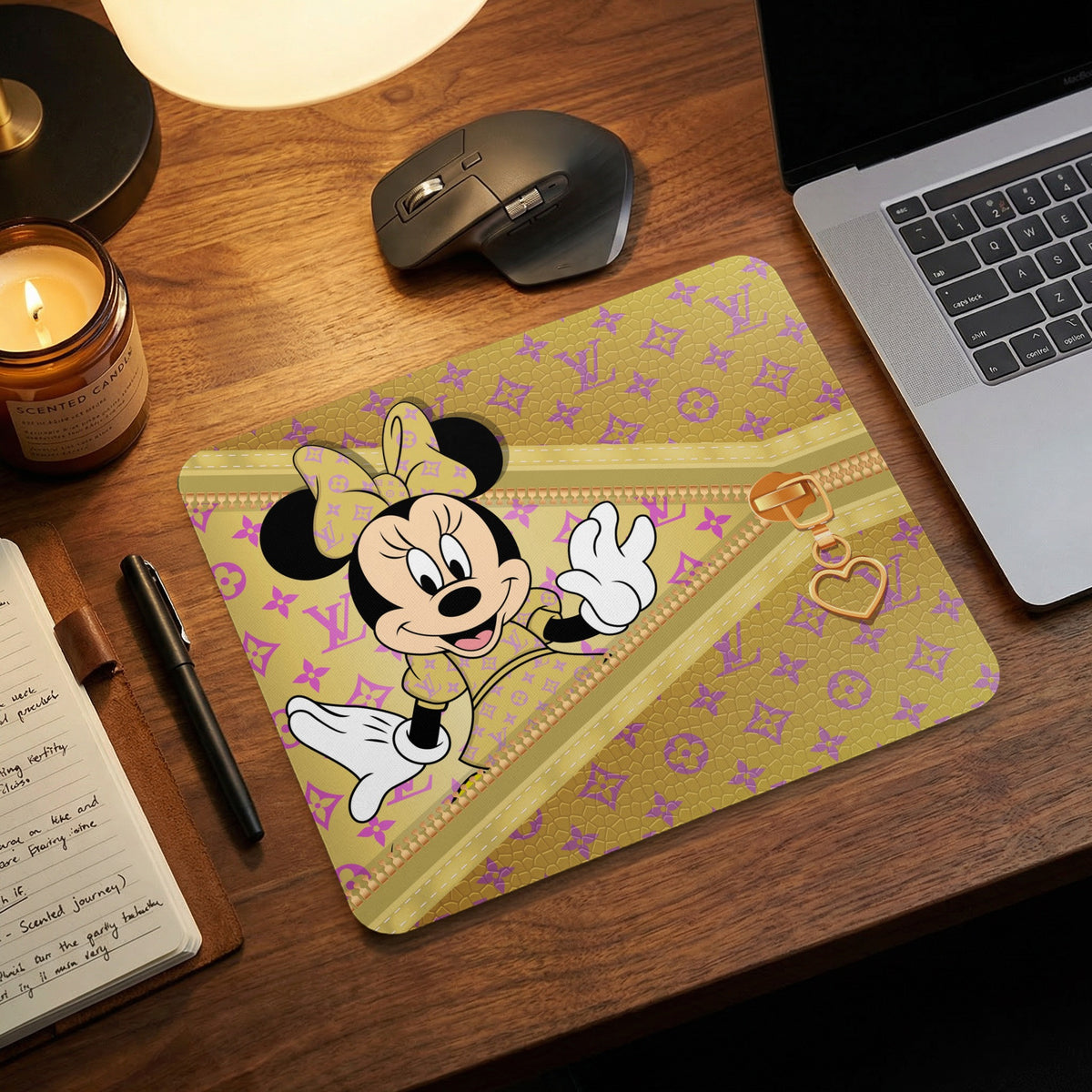 Minnie Mouse on a gold mousepad with purple pattern and gold zipper detail.