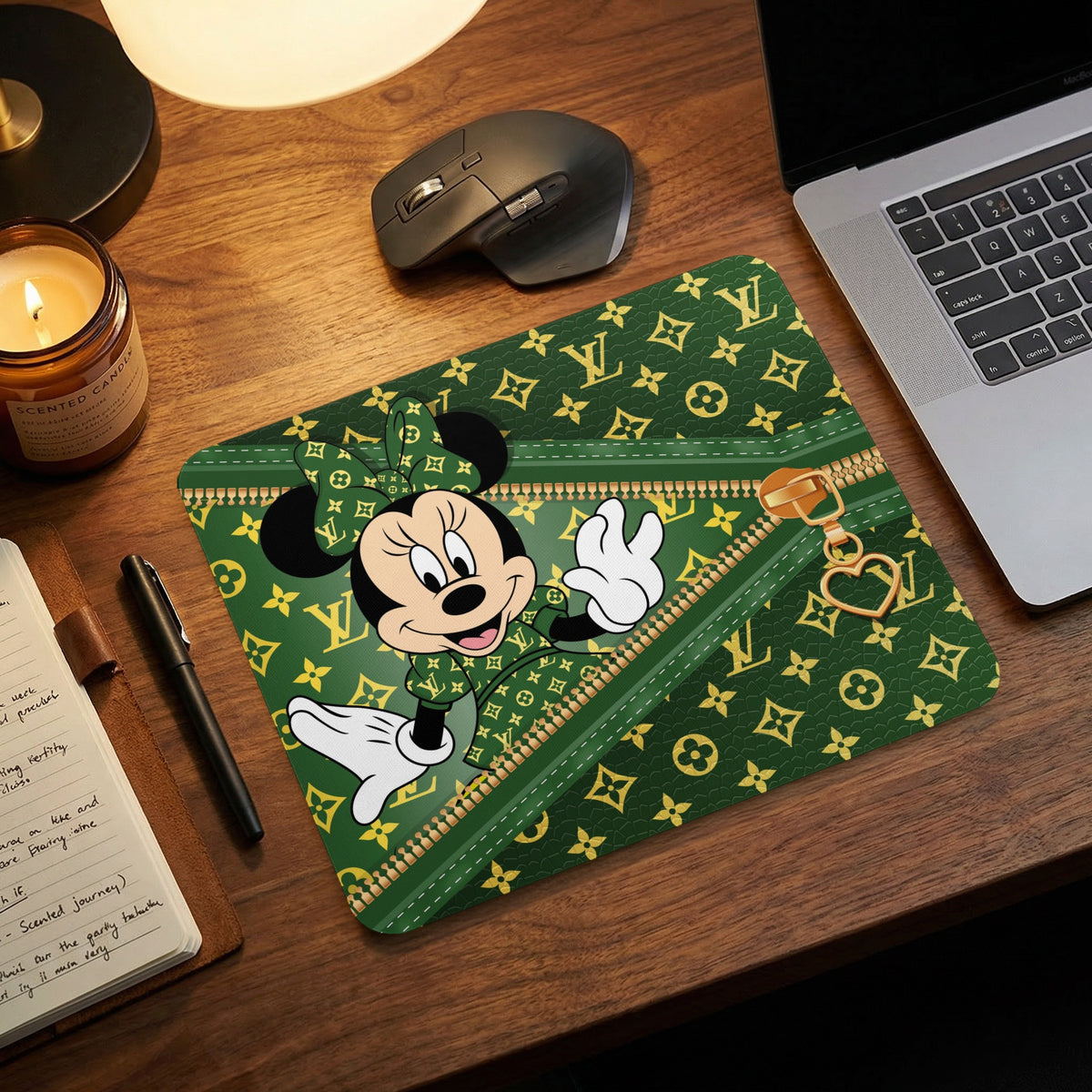 Minnie Mouse on a green mousepad with a gold zipper and LV-inspired pattern.