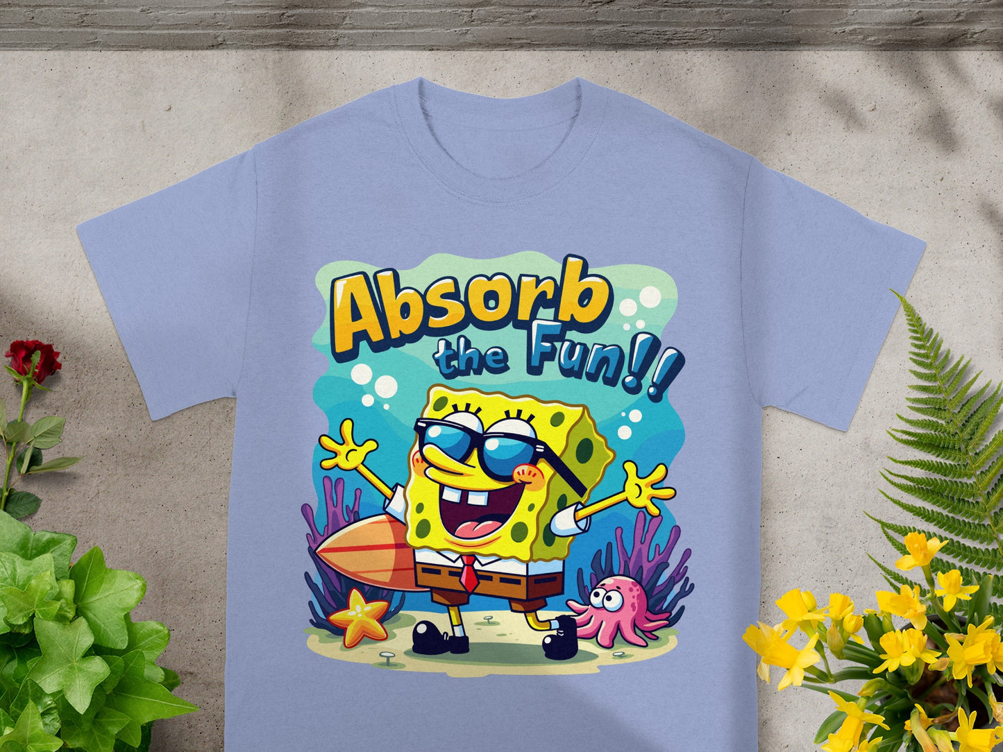 SpongeBob SquarePants with a surfboard and a starfish, saying "Absorb the Fun!"