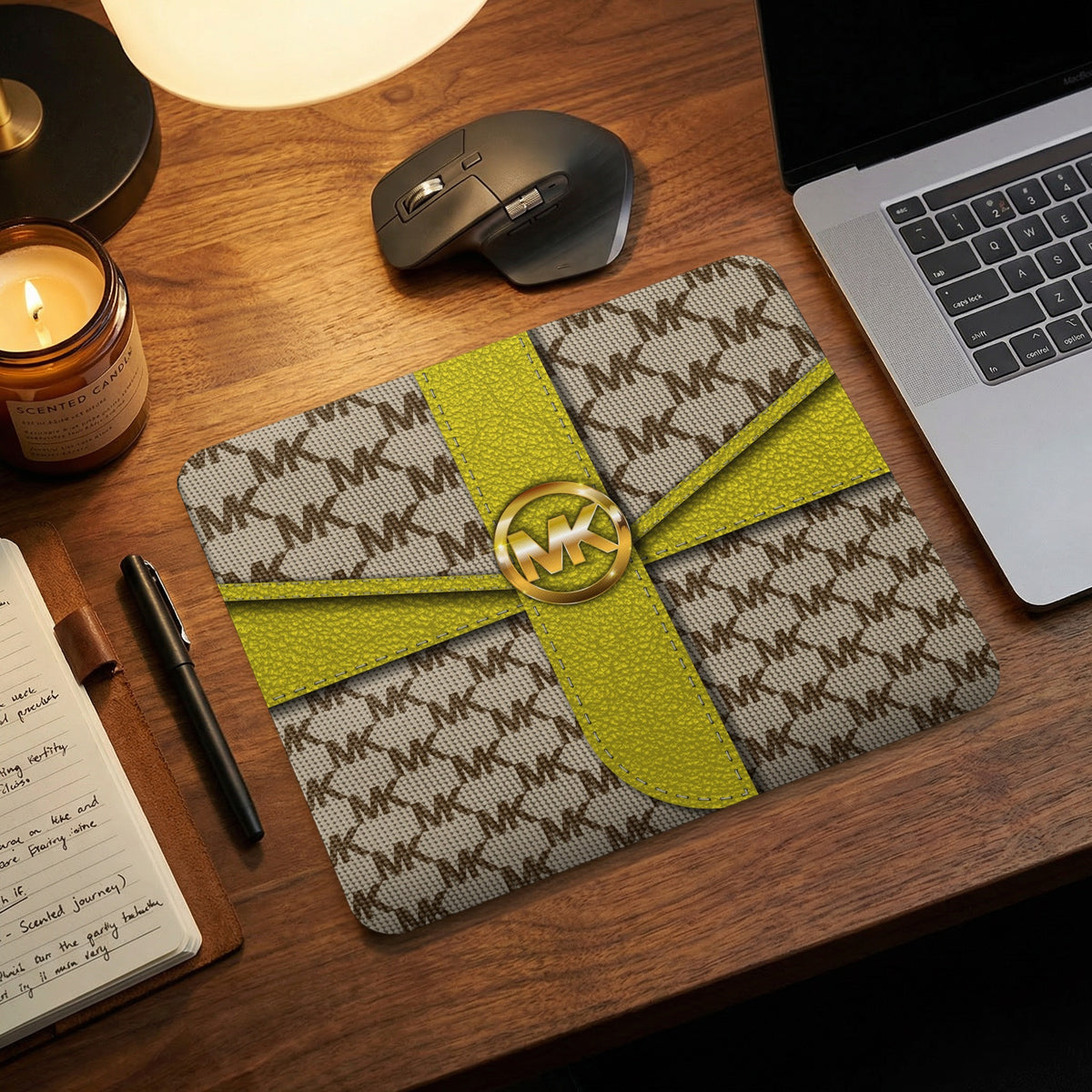 Michael Kors MK logo mousepad with yellow ribbon detail.