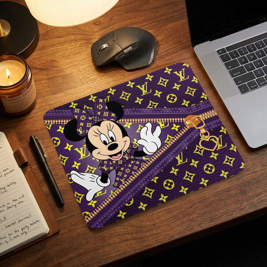 Minnie Mouse on purple and yellow pattern mousepad with zipper detail.