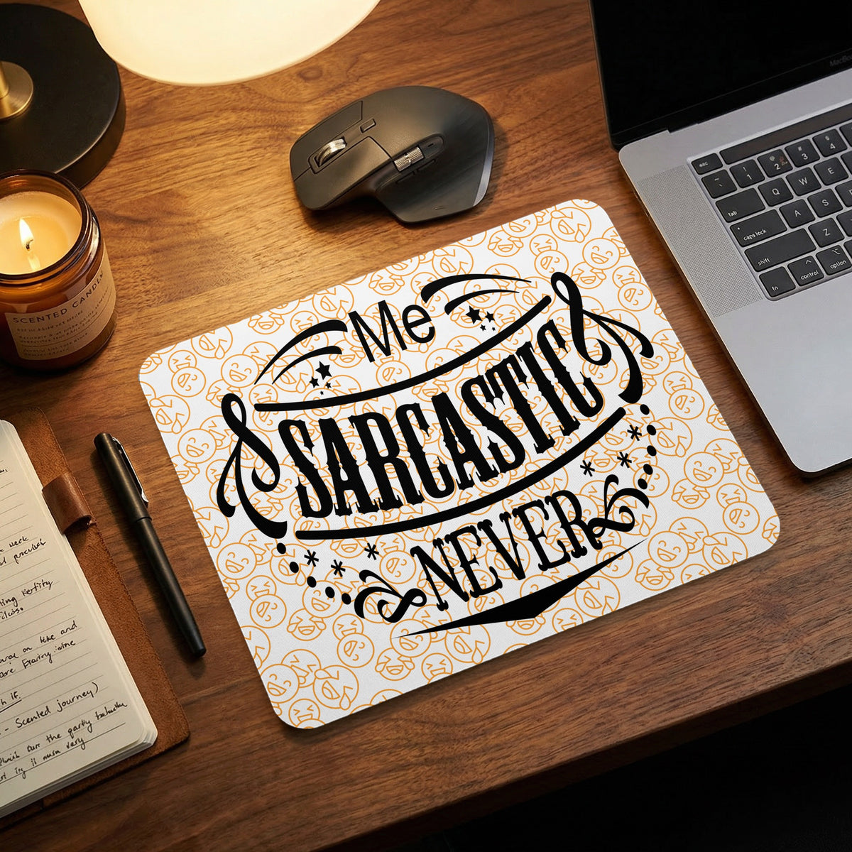 A mouse pad with the text Me Sarcastic Never and a background pattern of laughing emojis.