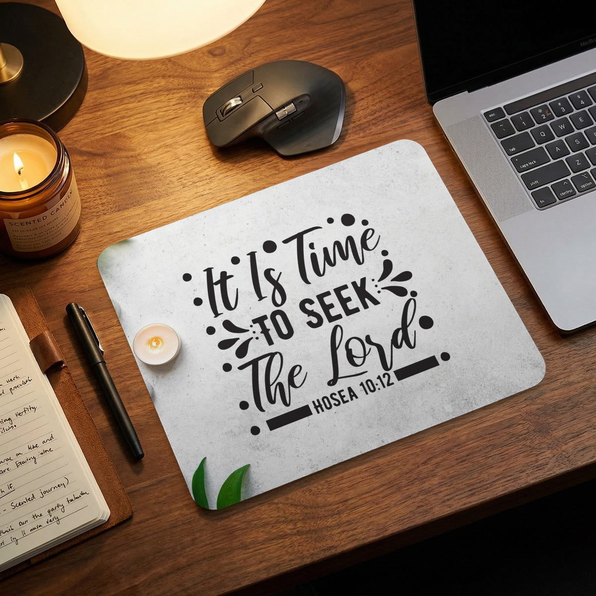 White mousepad with black text reading It Is Time To Seek The Lord Hosea 10 12 on a wooden desk.
