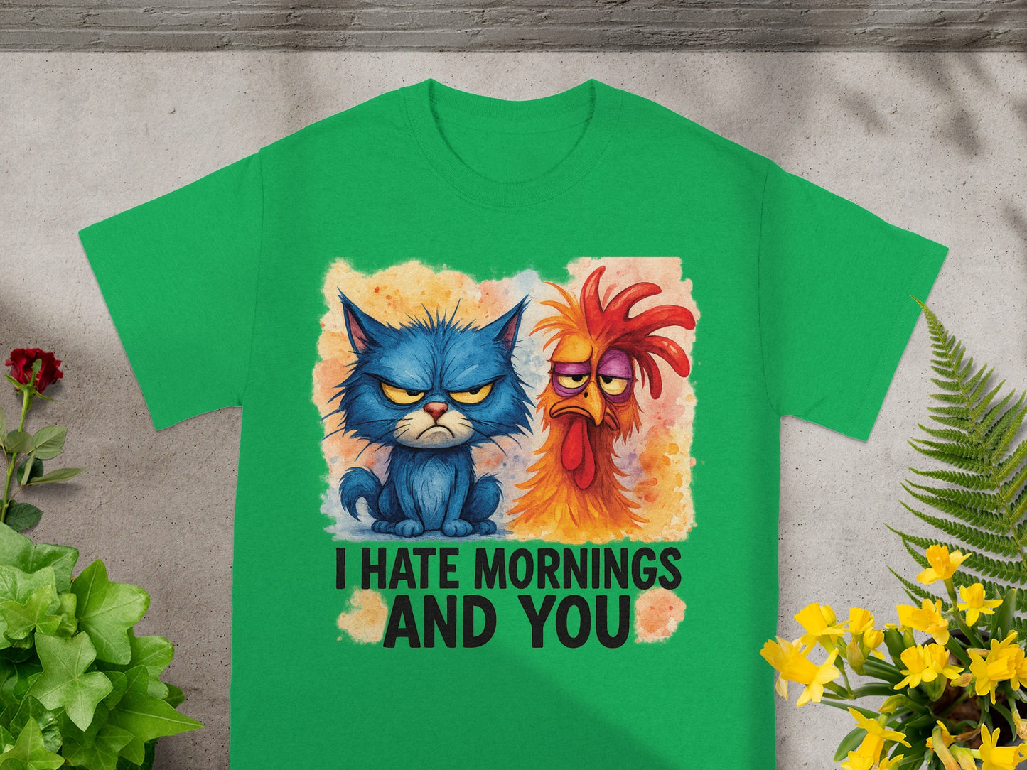 Green t-shirt with cartoon cat and rooster, text "I HATE MORNINGS AND YOU".