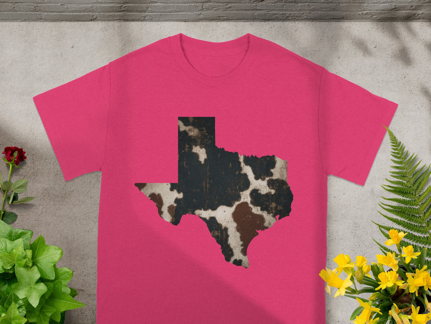 Fuchsia t-shirt with Texas shape in cowhide pattern.