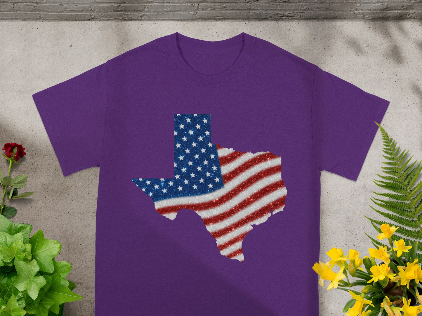 Purple t-shirt with glitter Texas flag graphic.