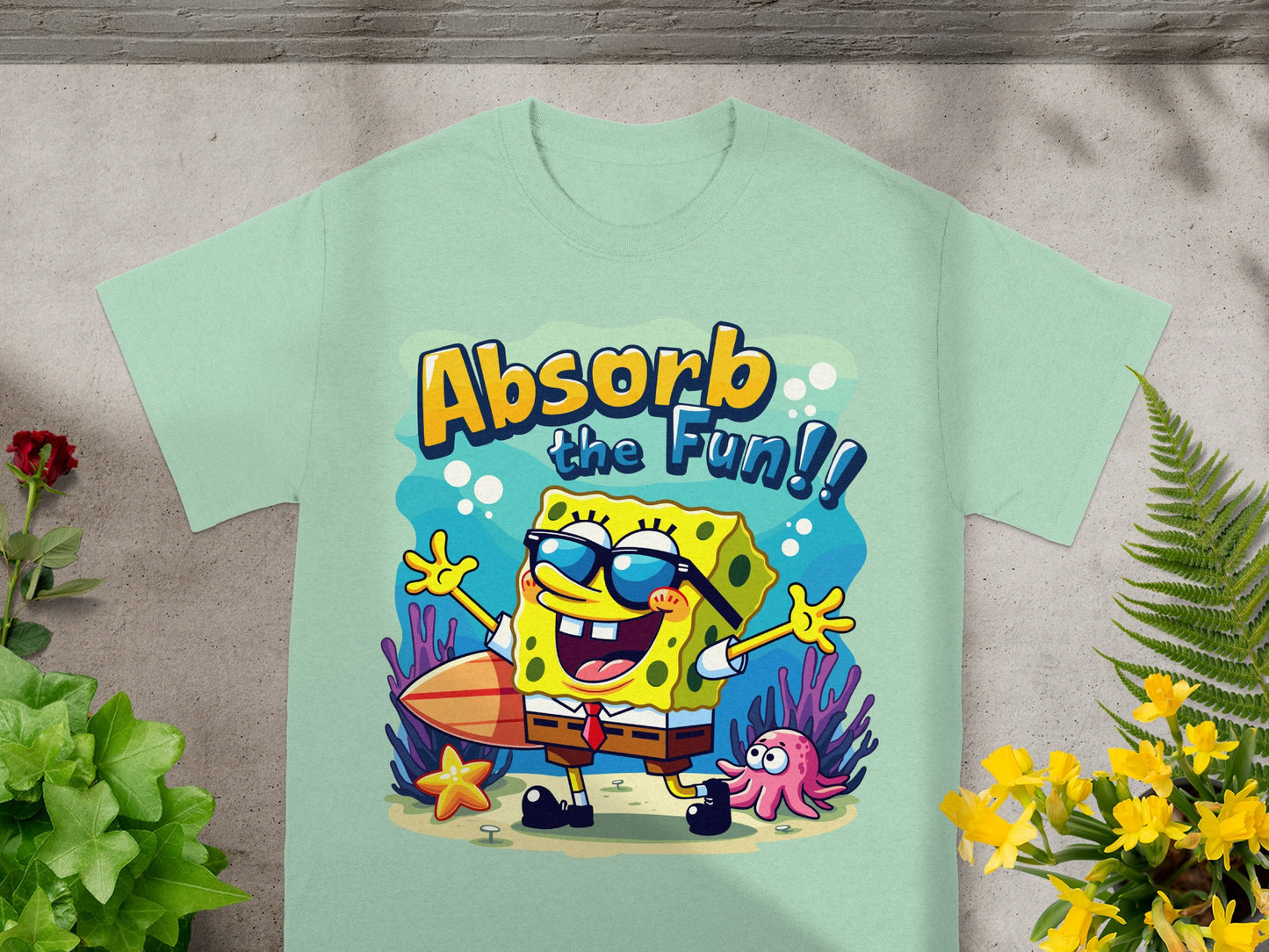 SpongeBob SquarePants wearing sunglasses with a surfboard and the text "Absorb the Fun!!"
