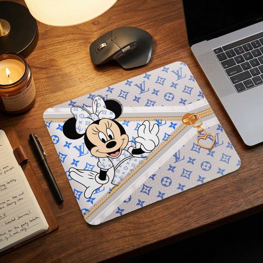 Minnie Mouse with a faux zipper and heart charm on a grey and blue monogram mousepad.