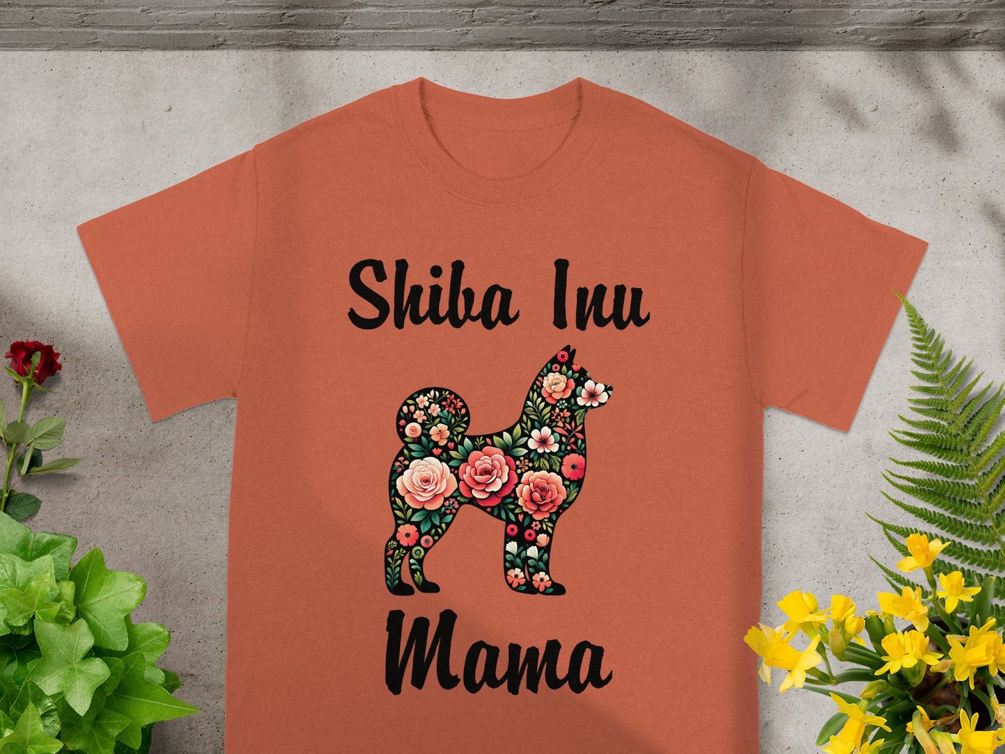 Orange t-shirt with "Shiba Inu Mama" text and floral Shiba Inu design.