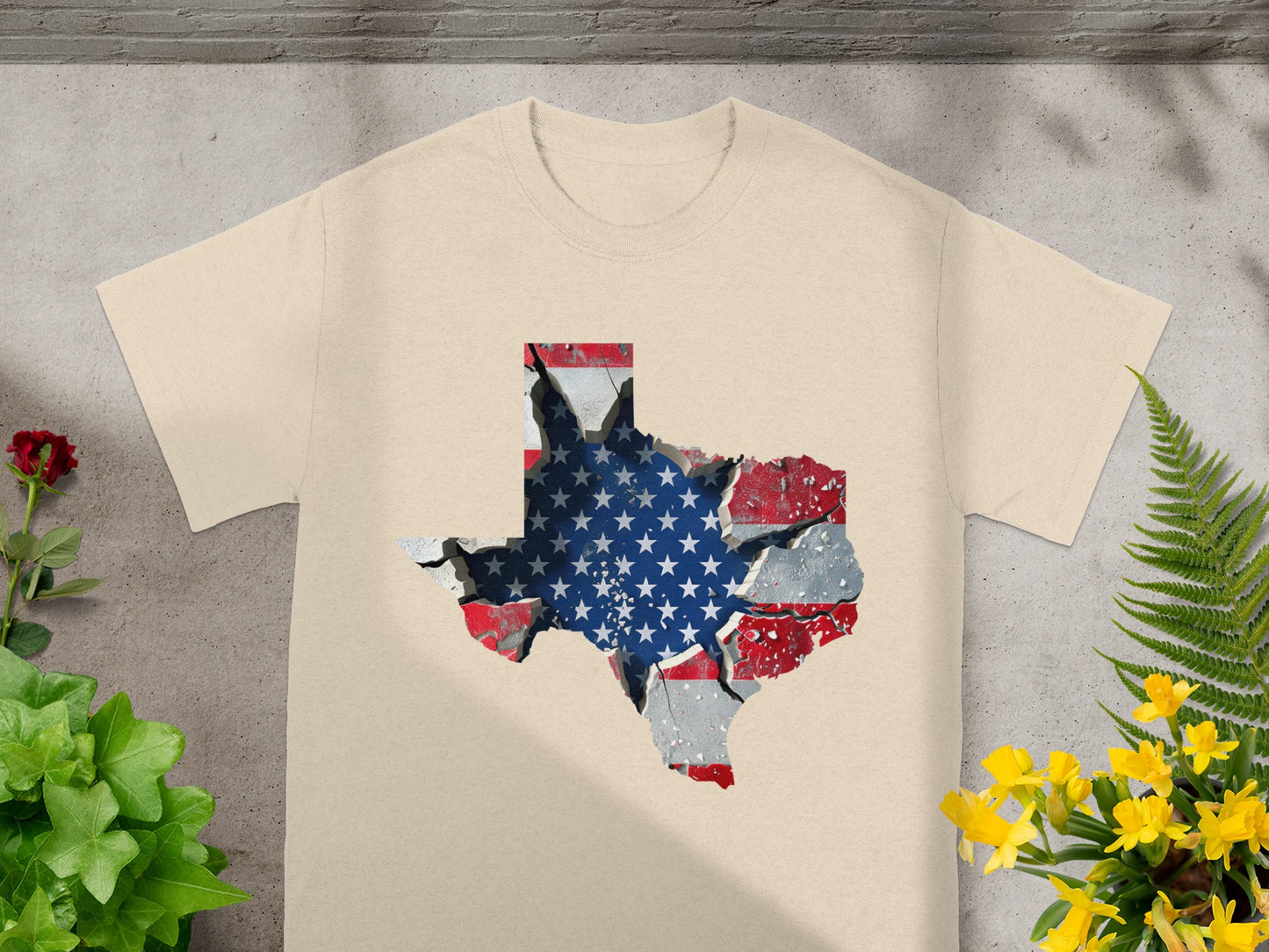 T-shirt with cracked Texas outline filled with American flag pattern.