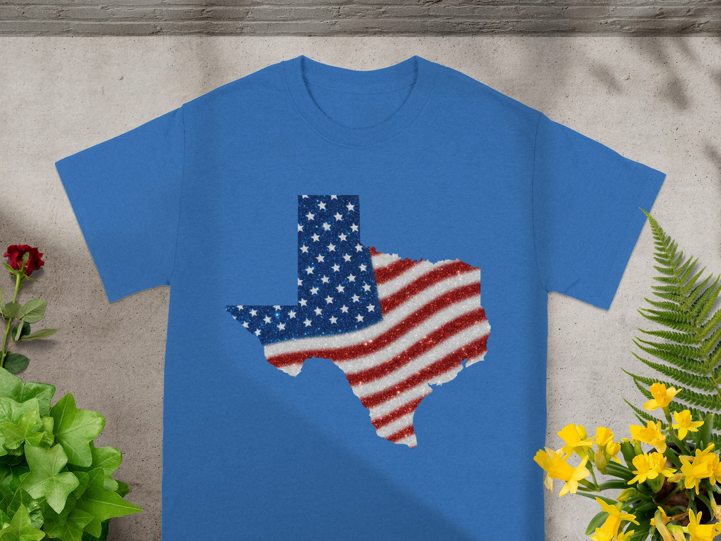 Blue t-shirt with a glittery Texas outline in US flag colors.